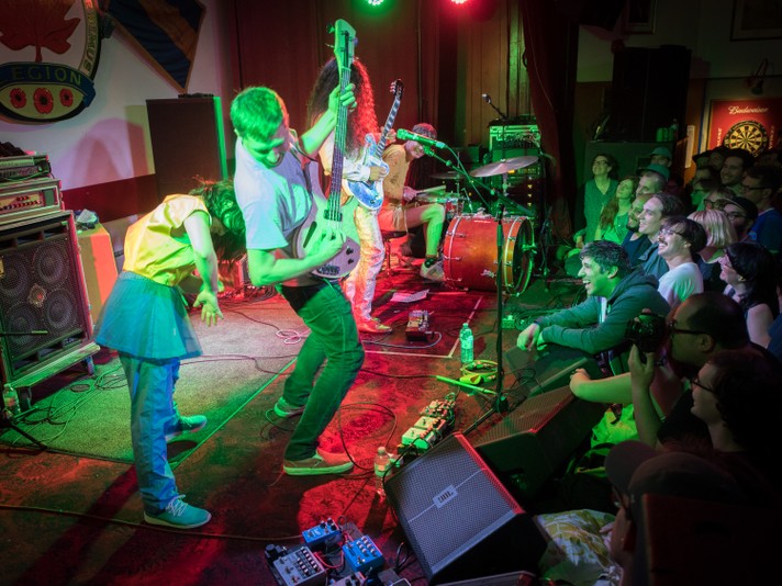 The group Deerhoof is seen performing on stage at the #1 Royal Canadian legion during Sled Island 2018.