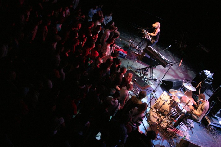 A tilted aerial shot shows the duo Mates of State playing drums and keyboard during their performance at Theatre Junction Grand for Sled Island 2007.