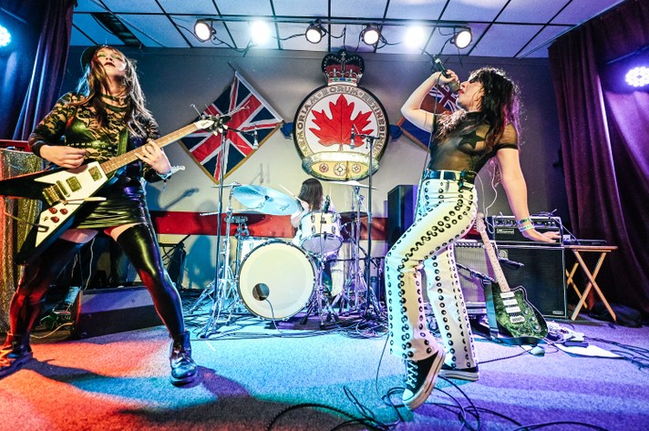A photo of the group Mannequin Pussy performing at the #1 Royal Canadian Legion during Sled Island 2023.